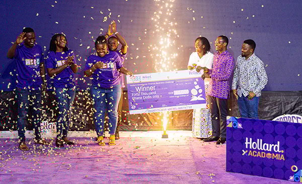 Hollard Ghana and winner Jnelp Innovations on stage with confetti