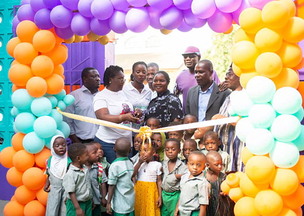 Hollard Ghana cutting the ribbon at Al-Waleed Kindergarten to celebrate their renovation