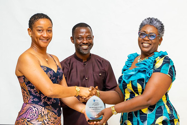 Hollard Ghana holding their Broker Excellence award at the IBAG Conference