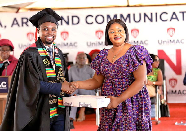Hollard Ghana handing Richard Strauss-Ashiaby, the best-graduating student from UniMAC-IJ his prize