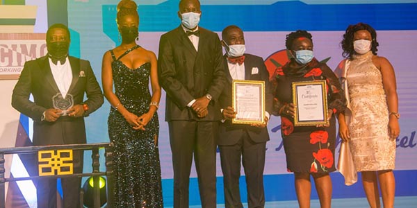 Hollard Insurance on stage with their award at CIMG Awards 2020