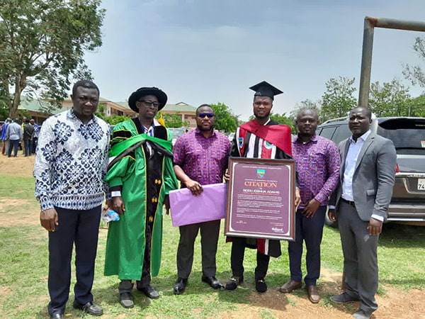 Hollard Ghana and Seidu Joshua Adams with his award for the overall best-graduating student of the University of Energy and Natural Resources