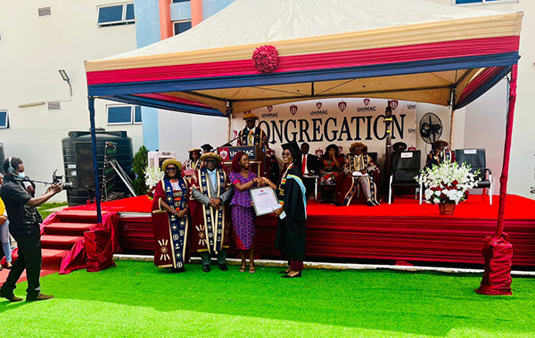 The Hollard Ghana team giving the Hollard prize to Valedictorian, Carlene Affram
